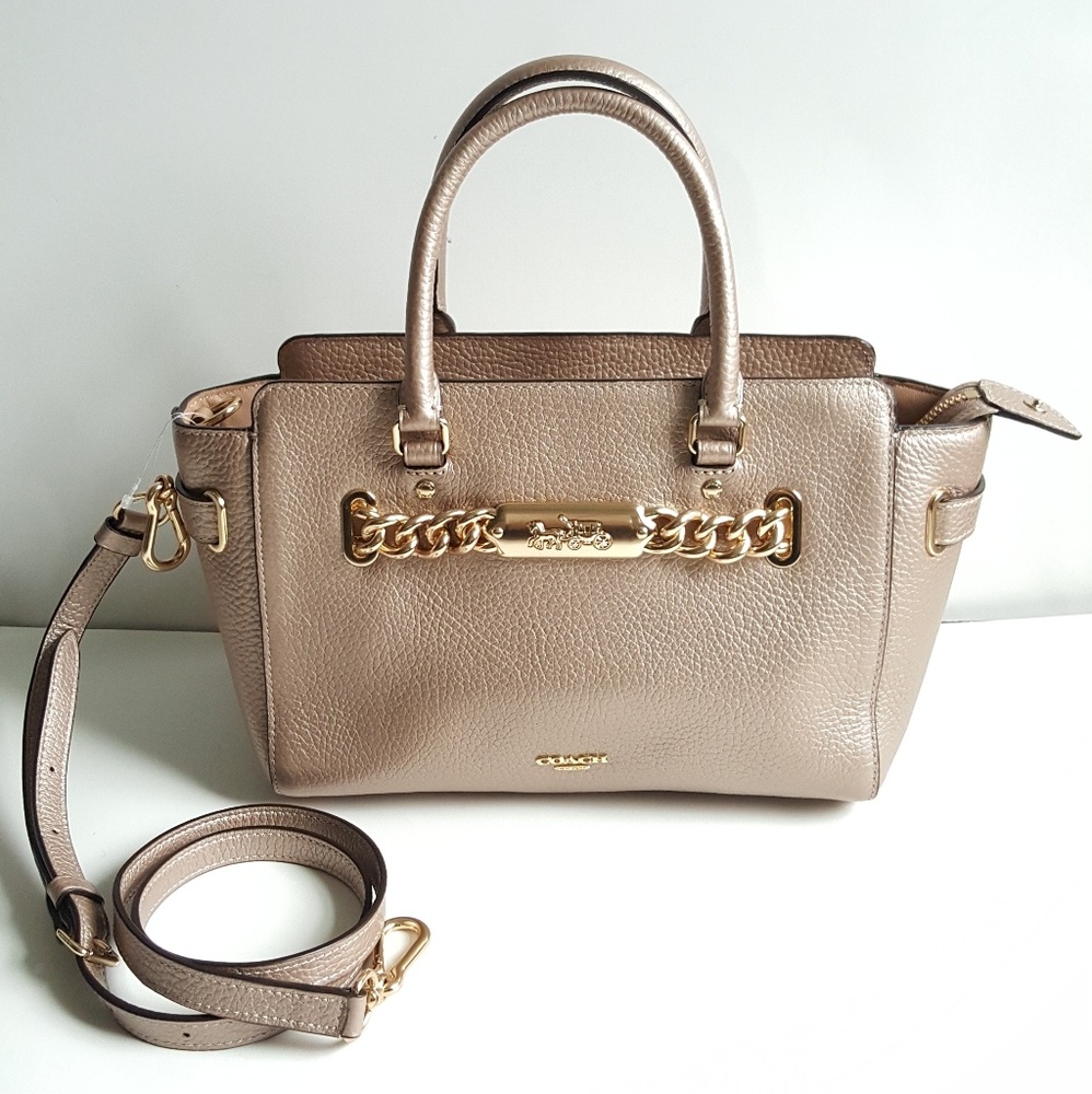 Coach signature leather arm and cross body bag.